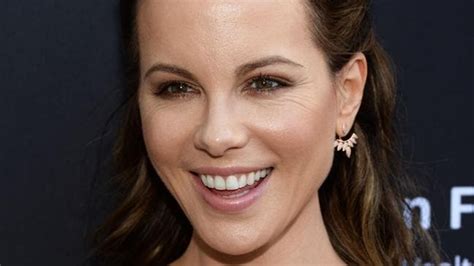 Kate Beckinsale poses topless in lacy underwear